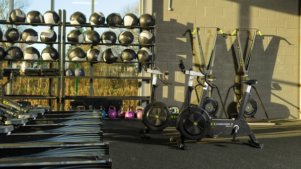 Sun shining on ergs in a gym